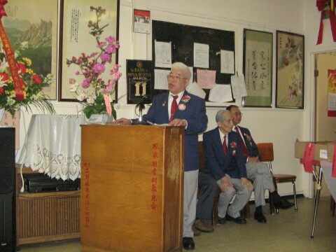 Emcee Steven Yee at noon ceremony