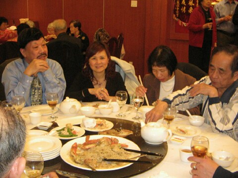 Phillip Yu and wife, Wayne Yee and wife
                    enjoyed their dinner.