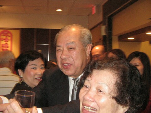 Mr. Kan Yu toasting at our table