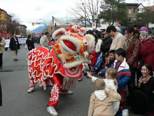 Greeting
                  the young parade watchers